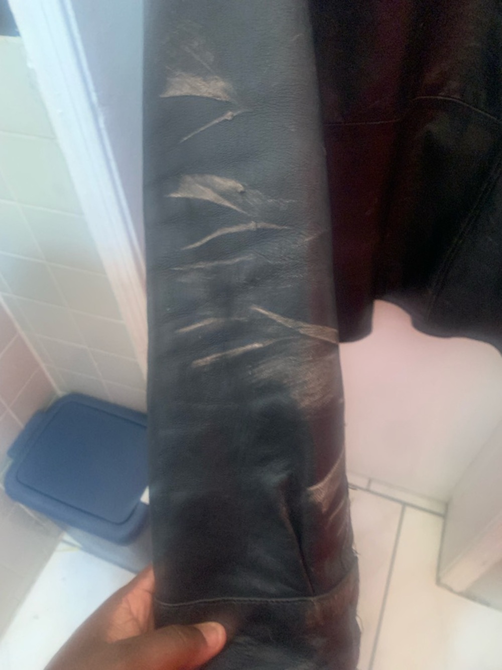 Black Leather Jacket Sleeve with Faded Wear